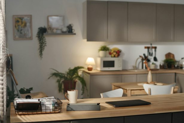 Modern domestic kitchen with gadgets on tble